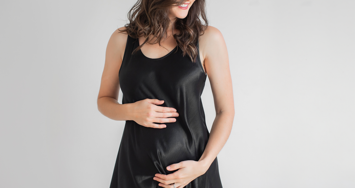 Stylish maternity clothes including dresses, leggings, and a maternity jumpsuit from Tupelo Honey